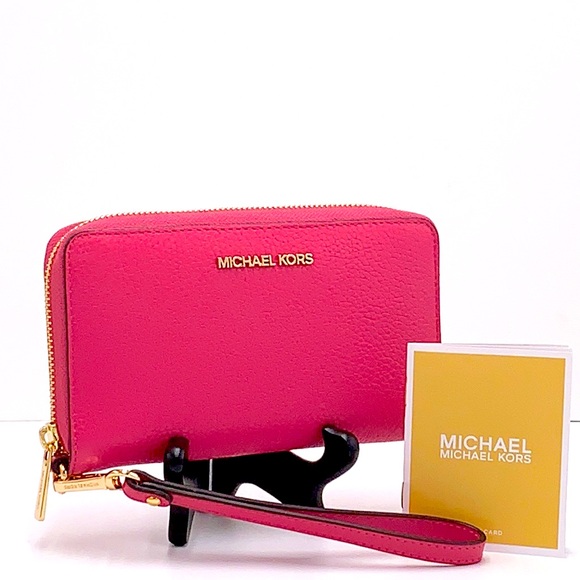 MICHAEL KORS LARGE FLAT
MULTIFUNCTIONAL PHONE CASE
ELECTRIC PINK COLOR - Picture 1 of 9